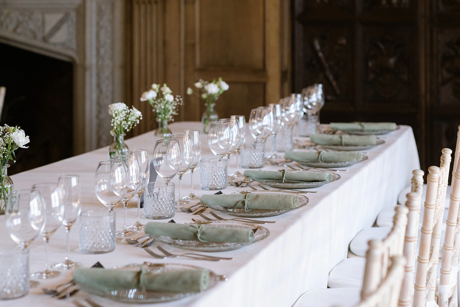 Long wedding table with white flowers at Chris and Emily’s Barcelona wedding