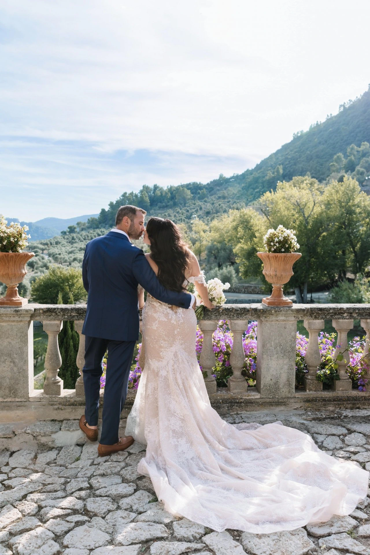 Guests seated at an outdoor wedding ceremony