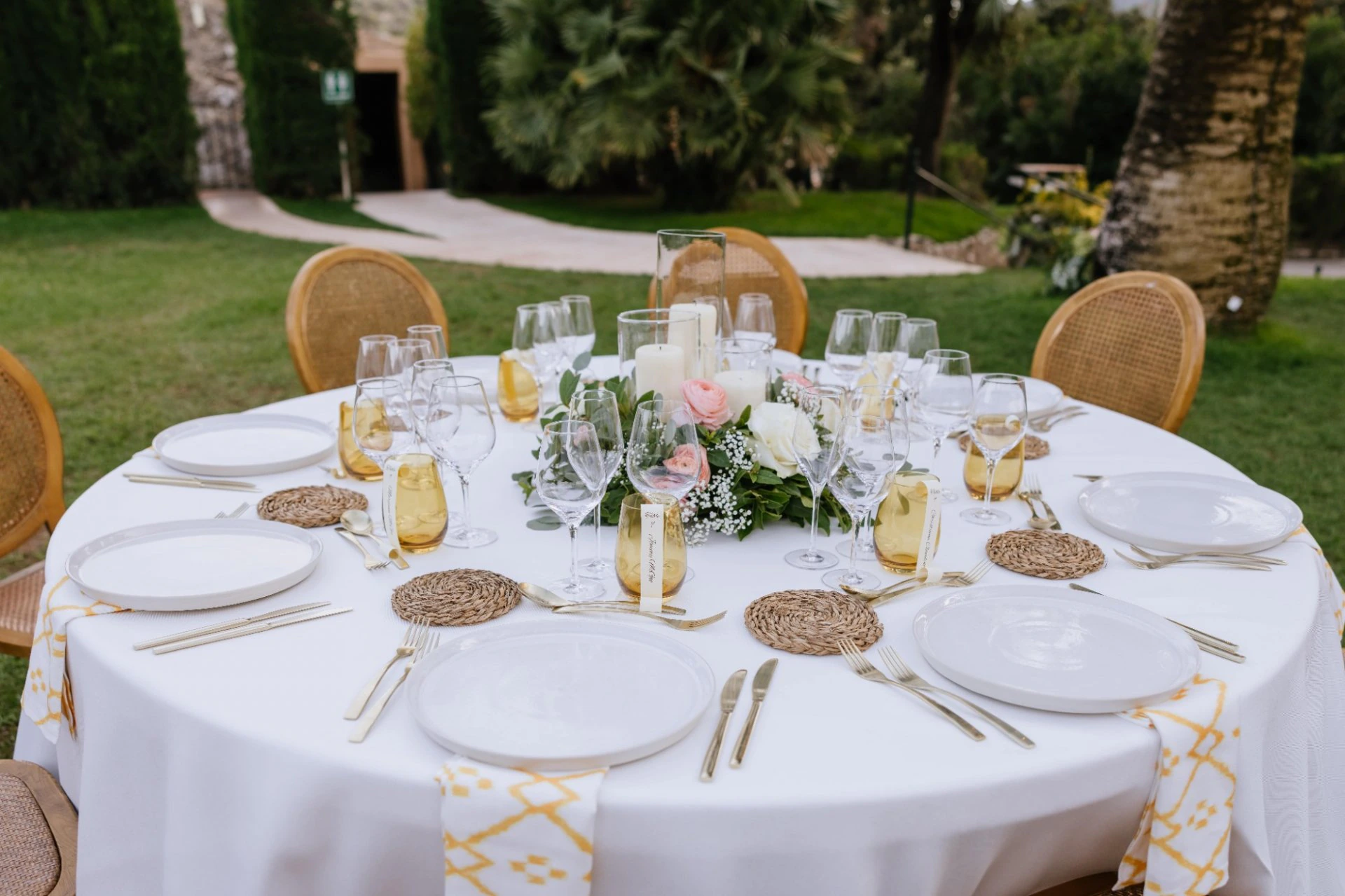 Round reception table with soft floral styling