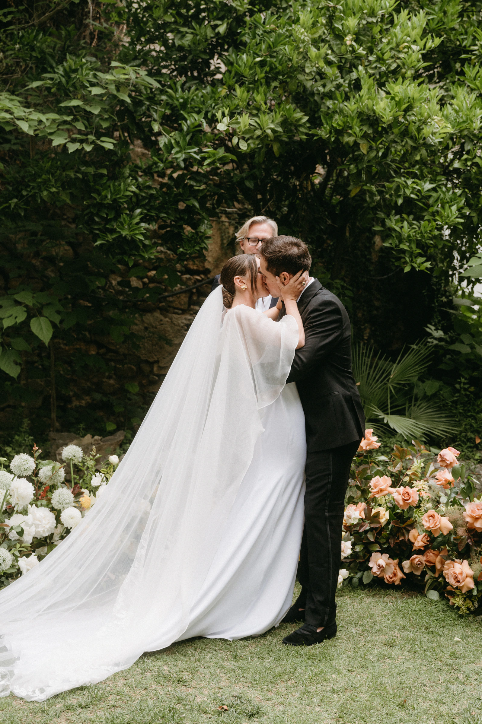 Rachel and Michael together at their garden wedding in Sitges