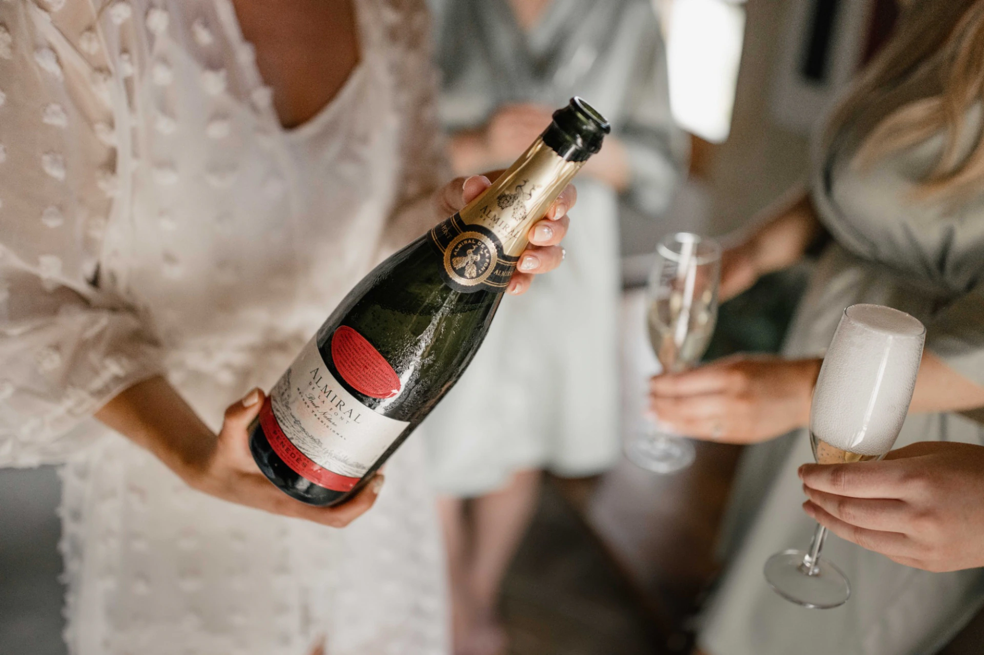 Champagne being poured during Samantha and Barry’s wedding preparations